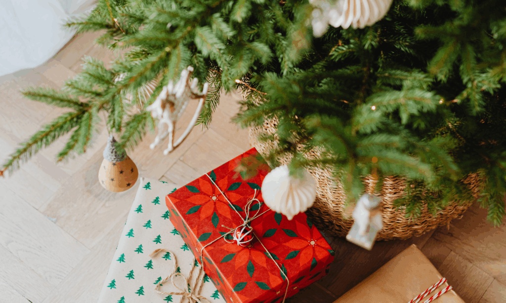 Presents under a small Christmas